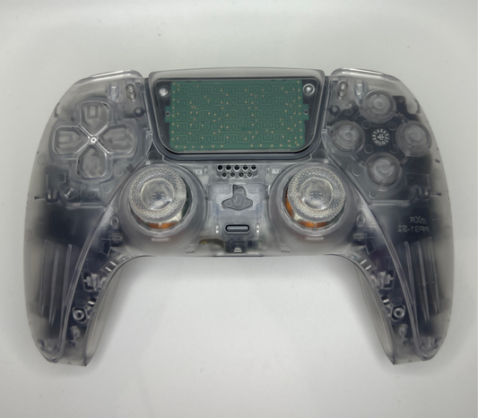 Clear PS5 controller on a white background